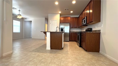 Kitchen with appliances with stainless steel finis