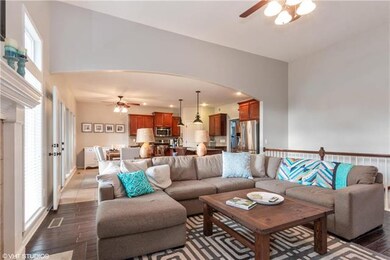Great room is open to both the kitchen and dining 