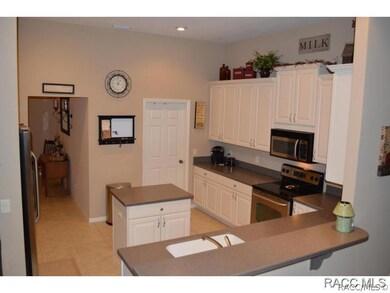 Kitchen towards laundry area