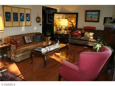 Living Room - NEW hardwood floors in this Formal L