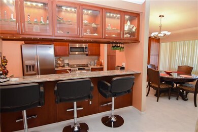 Kitchen with breakfast bar & dining room