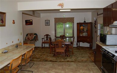Kitchen opens into dining room.