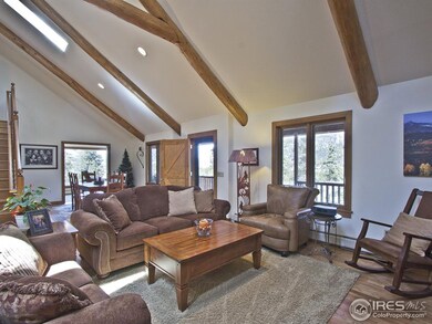 Living Room with Log Beam Accents