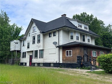 Rear view of property with central air condition unit