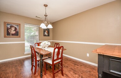 Formal Dining Room featuring laminate floors (2016).