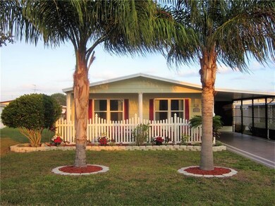 Florida palm trees in front of home.