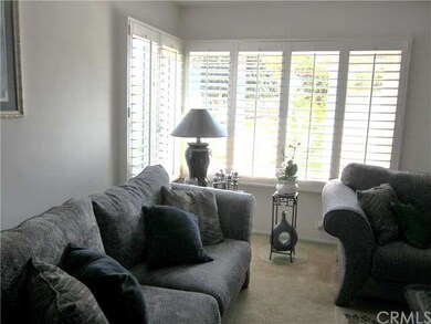 Beautiful plantation shutters in spacious living r