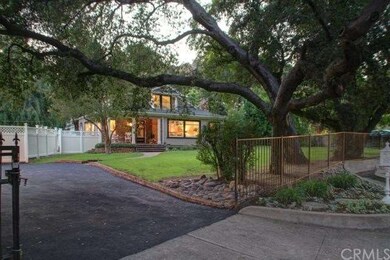 Front view of house from street showing driveway &