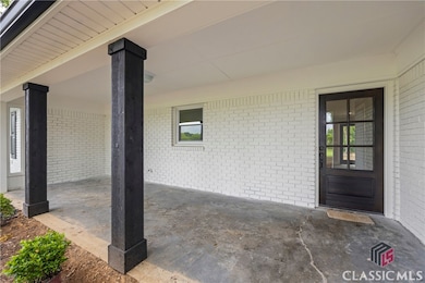 1180 Treadwell Bridge Rd, Statham, GA 30666 - photo 2