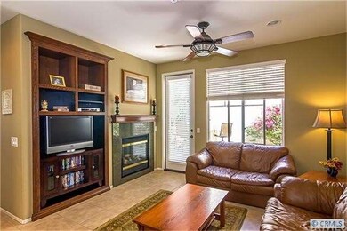 Family room with built in media, fireplace, and st