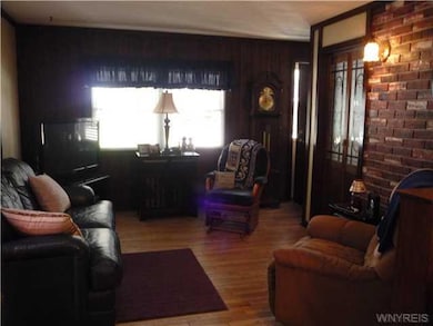 Living Room. Foyer entrance is to the right.  Beau