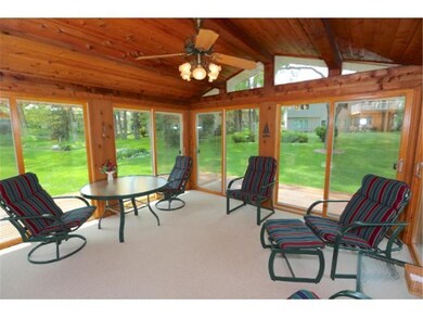 Cedar paneled, three season porch with vaulted cei