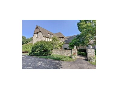 Beautiful French country home with stone trim