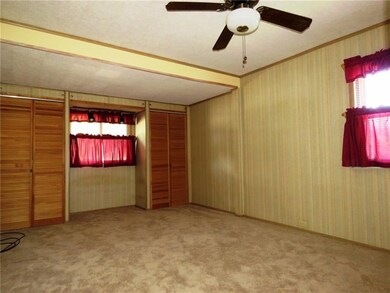 Spacious master bedroom with double closets.