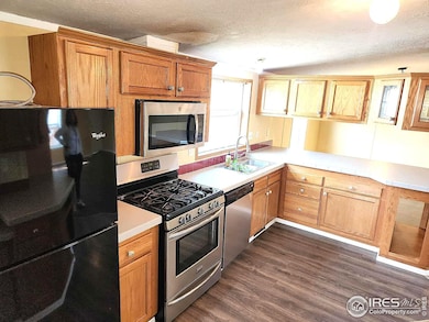 3334 Bluegrass Cir unit 57, Evans, CO 80620 - photo 4