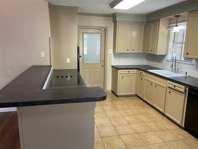 Kitchen - door to garage and utility room