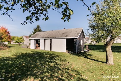 6945 Pine Island Dr NE, Comstock Park, MI 49321 - photo 5