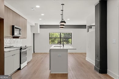 Not actual photos of the current listing. Simialr finishes and layout.