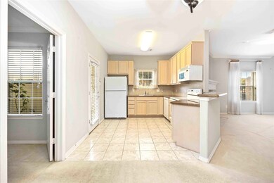 The Kitchen with Granite Countertops and an Includ