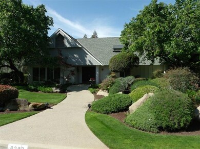 Returning to front walkway with mature landscaping