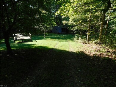 Standing at the cabin and looking back down the pr