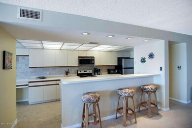 Opens to living/dining areas