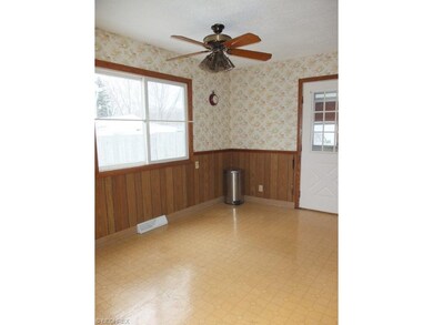 Dinette is open to the kitchen and living room.