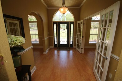 high ceilings & hardwood flooring.
