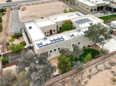 Birds eye view of back of property & yard.