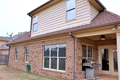 BRICK HOME FEATURING COVERED PATIO ON SIDE,M PRIVACY FENCED