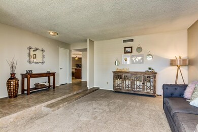 Newer Tile and Carpet Throughout
