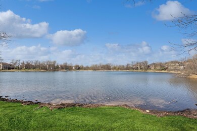 The view of Prairie Lake, literally just steps from the home.