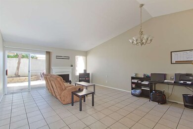 Living room is nice and bright with entry to the b