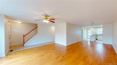 Open living room, dining area & kitchen