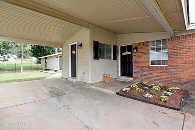 Front Door and Carport Area