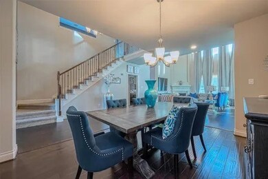 Dining room area leading up to stairway