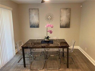 Dining space featuring hardwood / wood-style flooring
