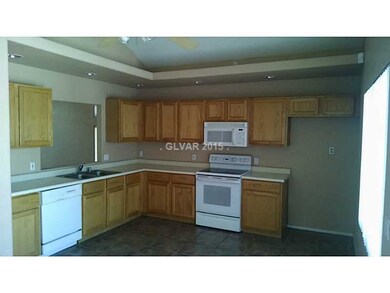 Kitchen. RECESSED LIGHTING, VAULTED CEILING.
