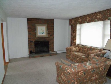 Living Room. Brick Wood Burning Fireplace.