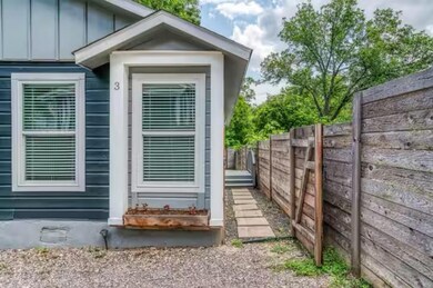 Property entrance with board and batten siding