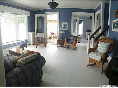 Great Room. Beautiful woodwork and window seat!