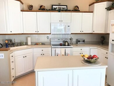 2199 Jonathan Ct SW unit 65, Byron Center, MI 49315 - photo 4