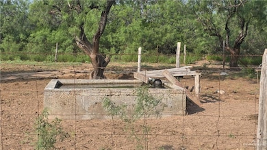 View of yard with a wooded view