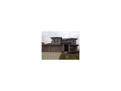 Stucco front elevation with front porch.