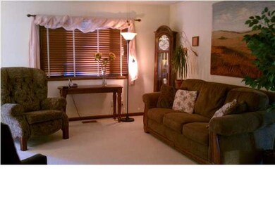 Sit back and relax in this inviting living room.
