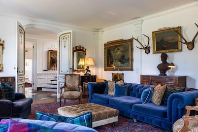 Living room with hardwood / wood-style floors and 