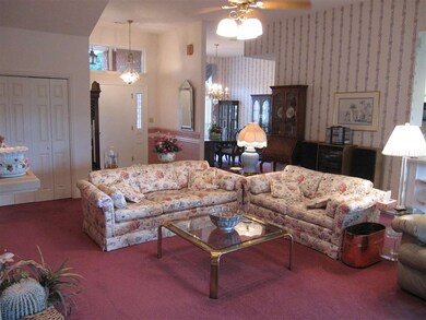 the left. Formal dining center. Kitchen to right.