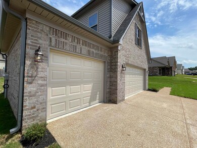 Garage with concrete driveway
