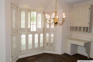 Spacious kitchen with a secretary.