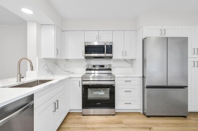 7290 Kinghurst Dr unit 301, Delray Beach, FL 33446 - photo 2